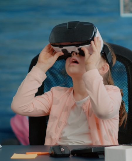 little-child-studying-with-vr-glasses-homework-online-classes little-child-studying-with-vr-glasses-homework-online-classes